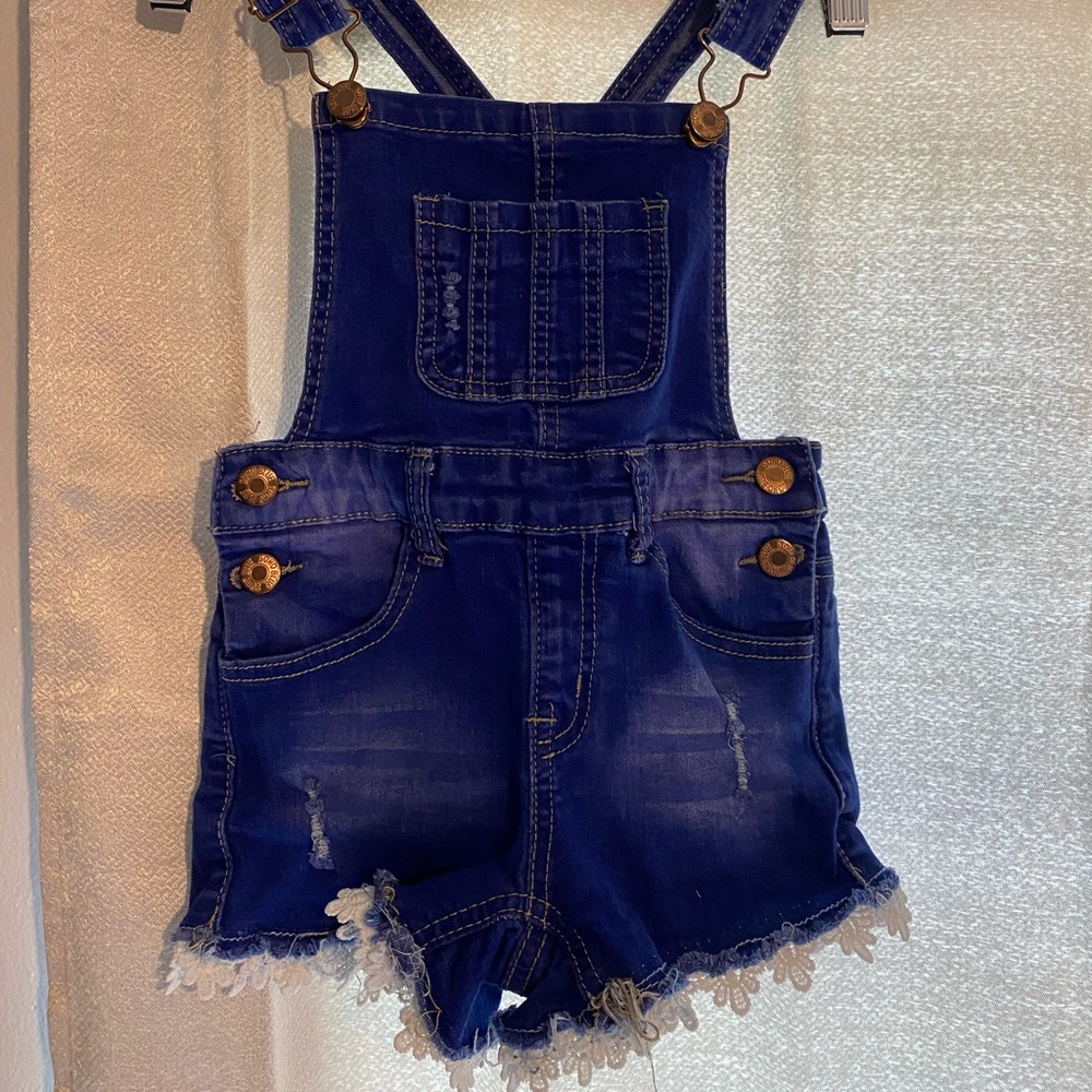 Soho Blue Child’s overalls size 6. Never worn. Frayed and floral trim.